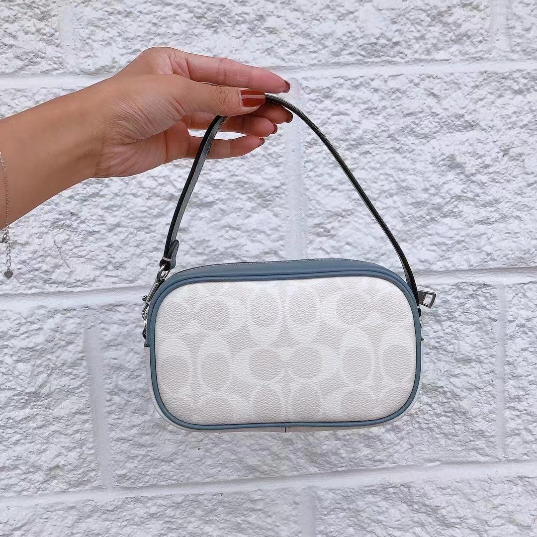 Coach CB851 Jamie Wristlet In Signature Canvas With Varsity Motif In SV/Chalk/Indigo